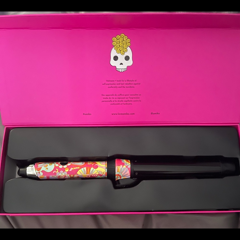 Amika The Autopilot 1.25” Rotating curling iron.